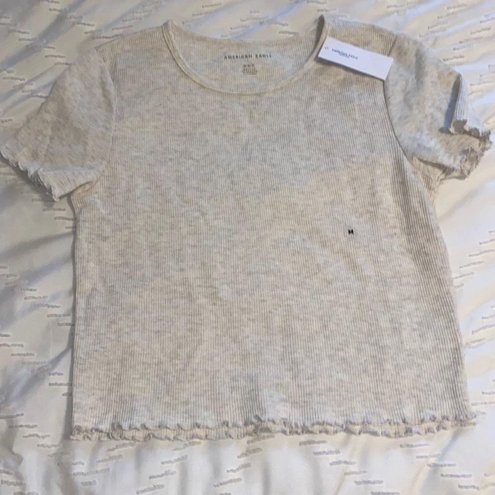 super cute cream ruffle top